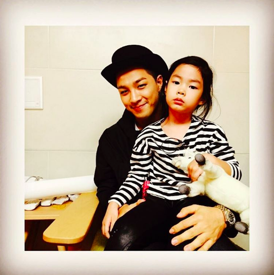 BIGBANG’s Taeyang Shares Throwback Photo With Tablo’s Daughter Haru